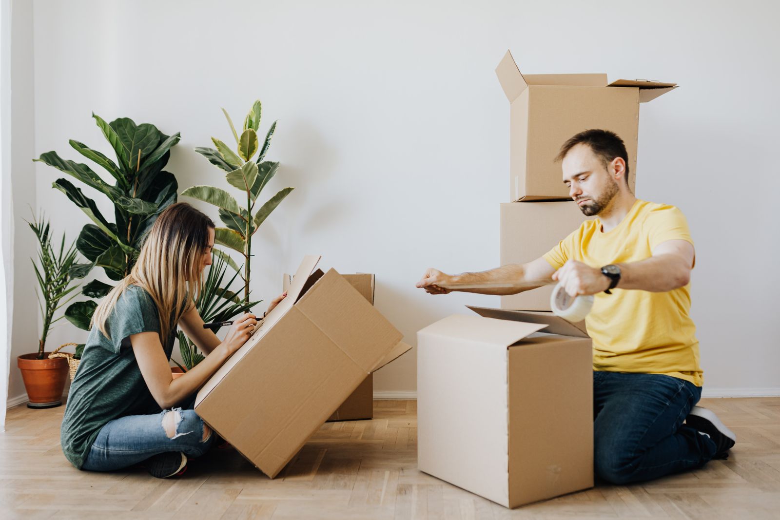 Couple relaxing in their new home